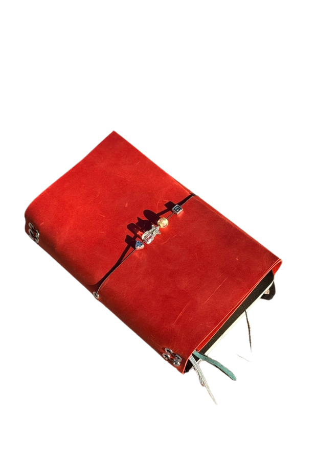 finished red trifold leather journal closed