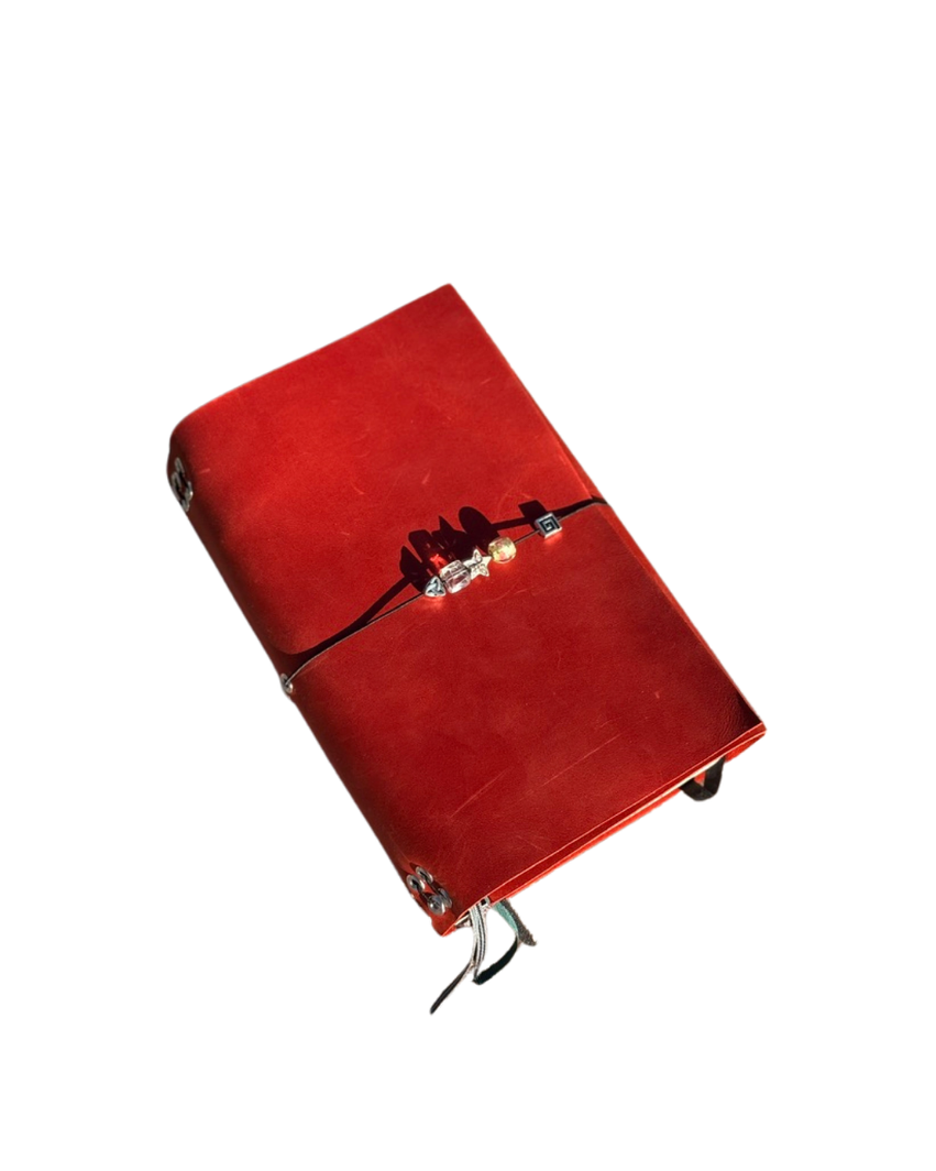 finished red trifold leather journal angled view