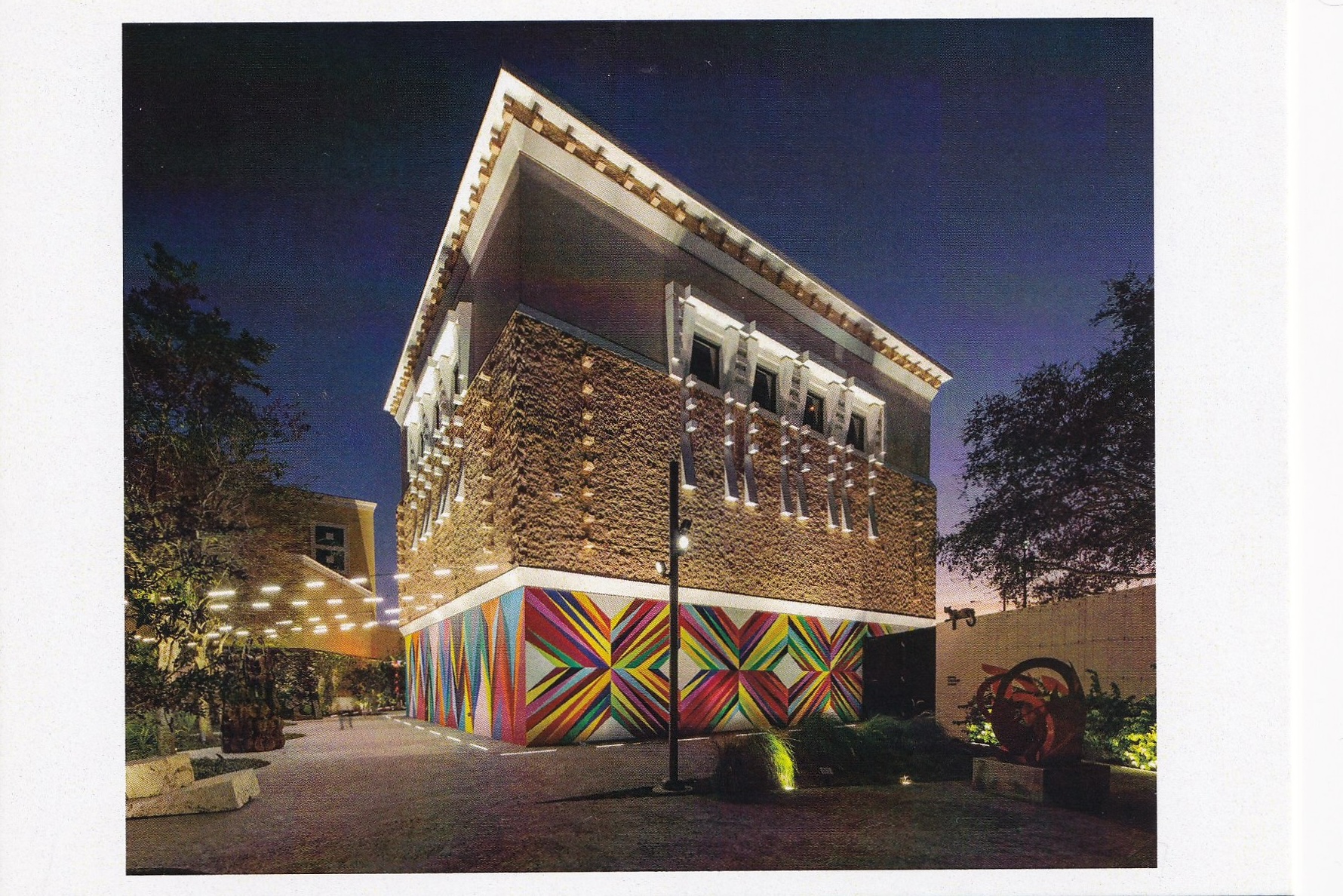 museum at night with mural