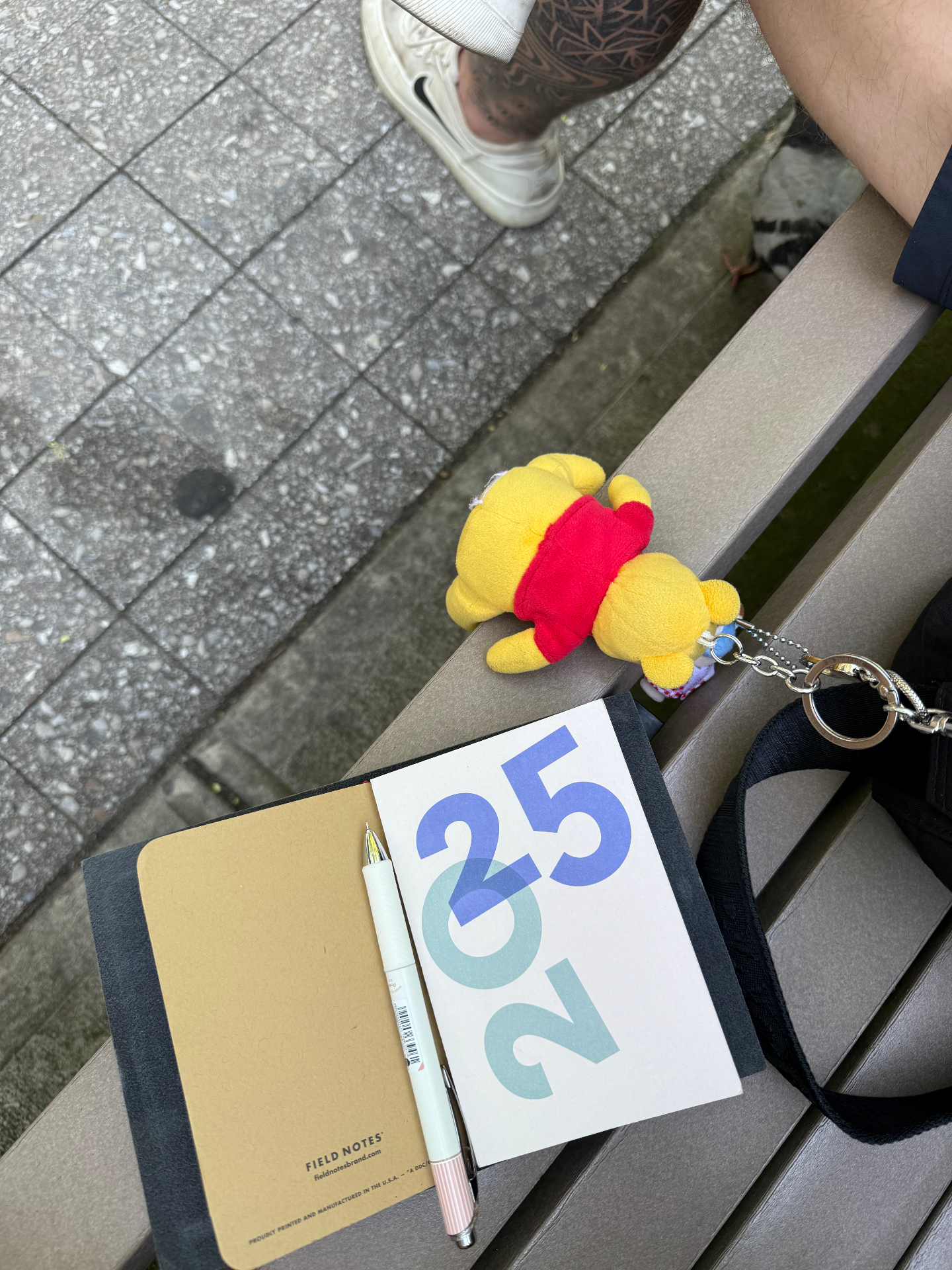 paper republic planner outside with winnie the pooh charm